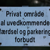 Sign showing the way to a private property